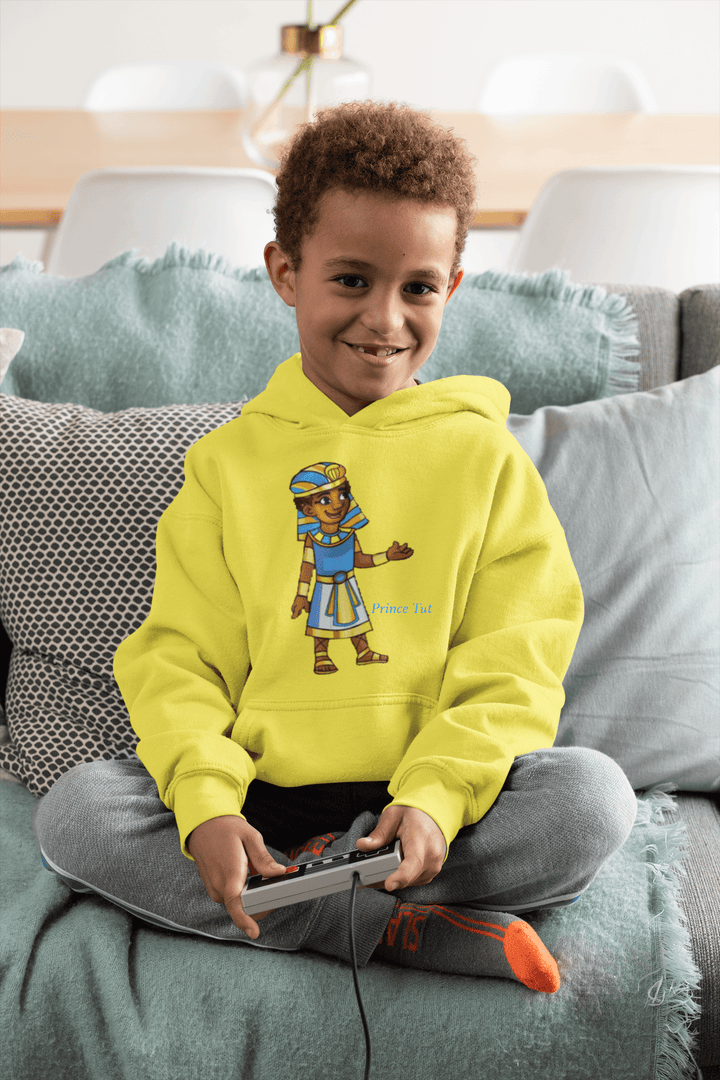 Tut hoodie from TL Johnson Stories featuring crown emblem and character name; cultural empowerment fashion for all ages.