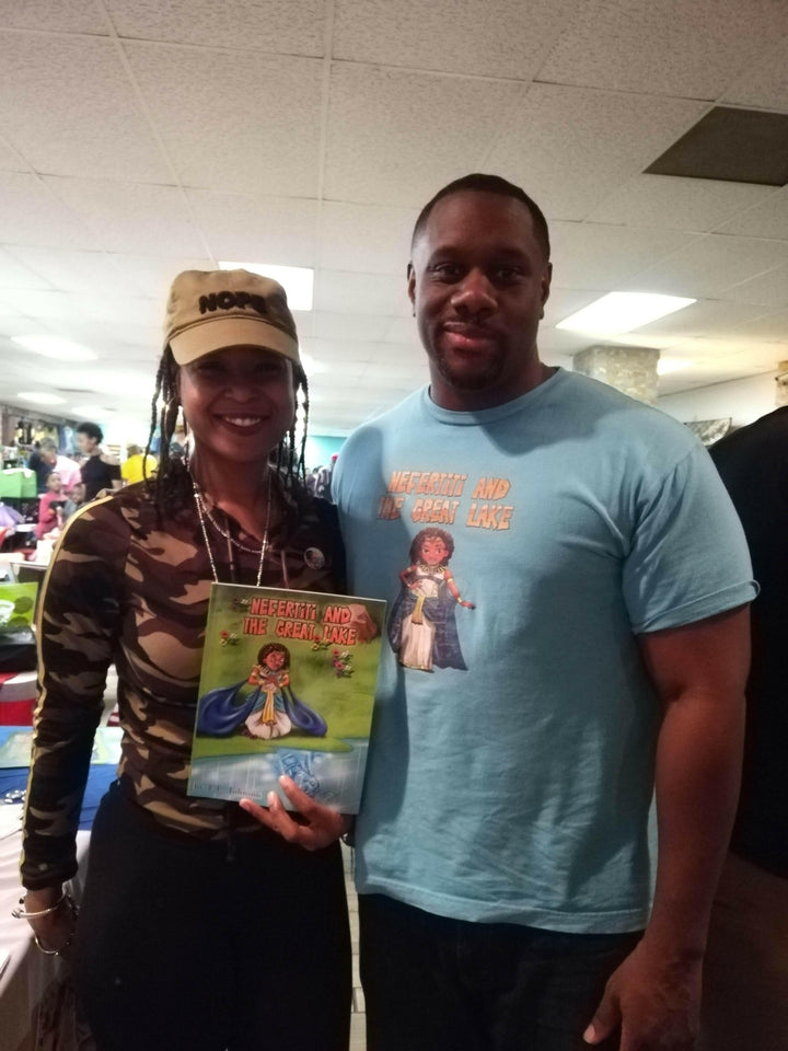 Picture of young woman holding Nefertiti & The Great Lake  (Mini Monarchs #1). with the author